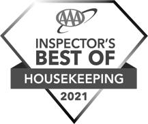 The image shows a diamond-shaped badge with the text "AAA Inspector's Best Of Housekeeping 2021" in black and white.