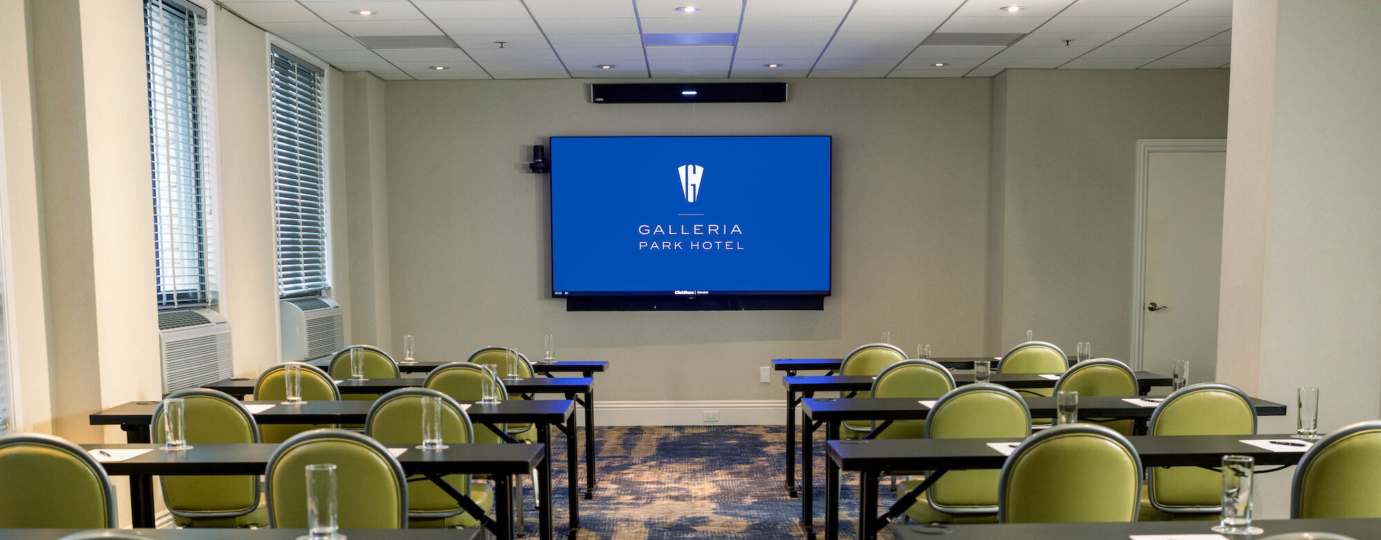 meeting space with ample seating and a television for presentations