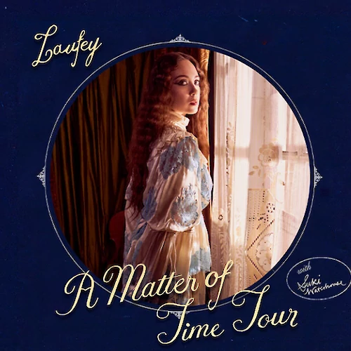 The image features a person standing by a window, with text saying "A Matter of Time Tour" and an autograph-like signature.