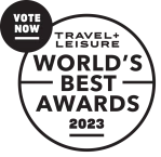 The image displays a logo for Travel + Leisure’s World's Best Awards 2023, featuring a "Vote Now" button in the top left corner of the logo.